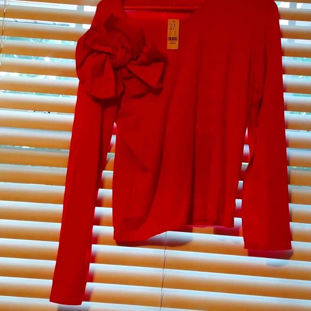 NYC pink sweater with huge bow .nwt size med